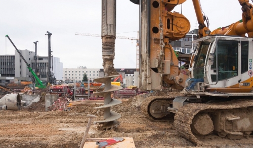 Using A Post Hole Digger With An Auger