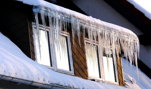 Winter Roof Care: Roof Rakes and Maintenance
